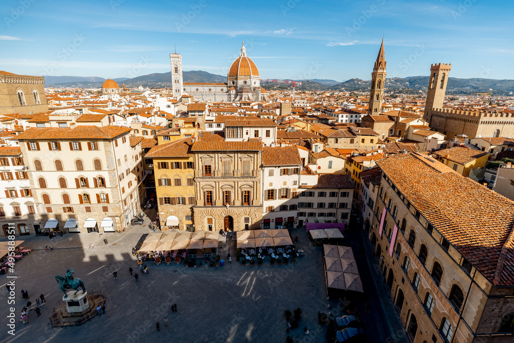 Aerial view on the old town of Florence with famous Duomo cathedral on skyline on sunny day. Outstanding cityscape of tuscany. View from Vecchio palace