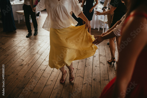 Party celebration. People dancing on the floor.