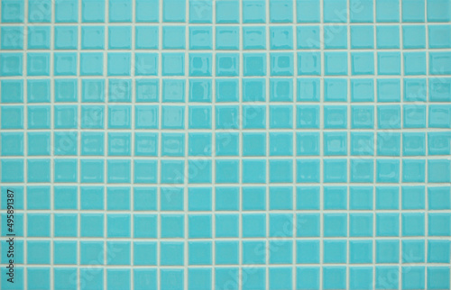 Blue pastel ceramic wall and floor tiles mosaic abstract background. Design geometric wallpaper texture decoration. 