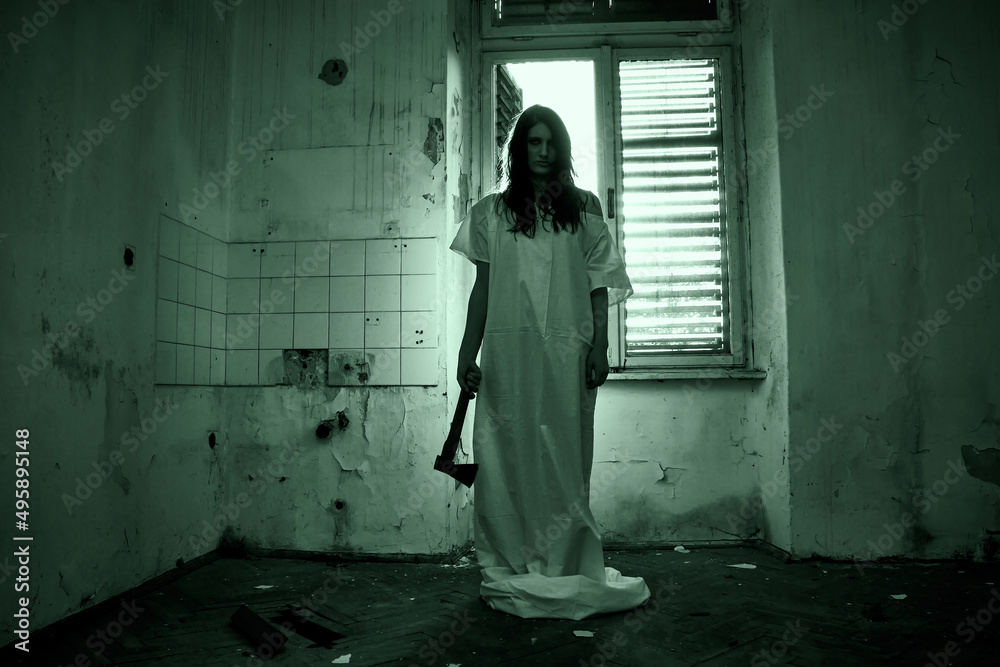 Horror scene of a scary woman in old derelict room