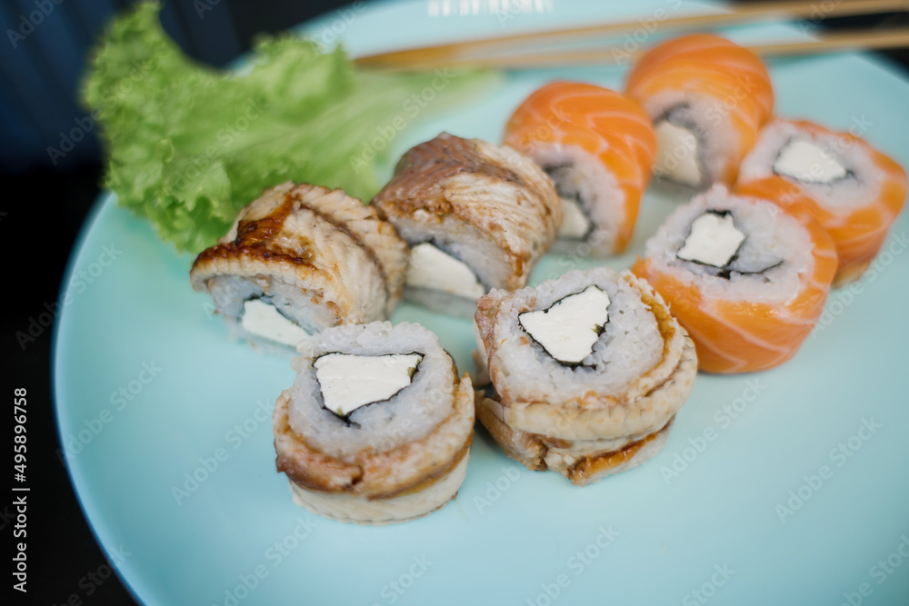 sushi roll with salmon and eel set japanese cuisine sushi roll with salmon and eel set japanese cuisine