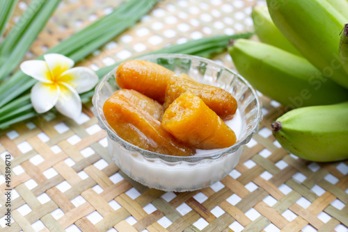 Banana in syrup with cocont milk photo