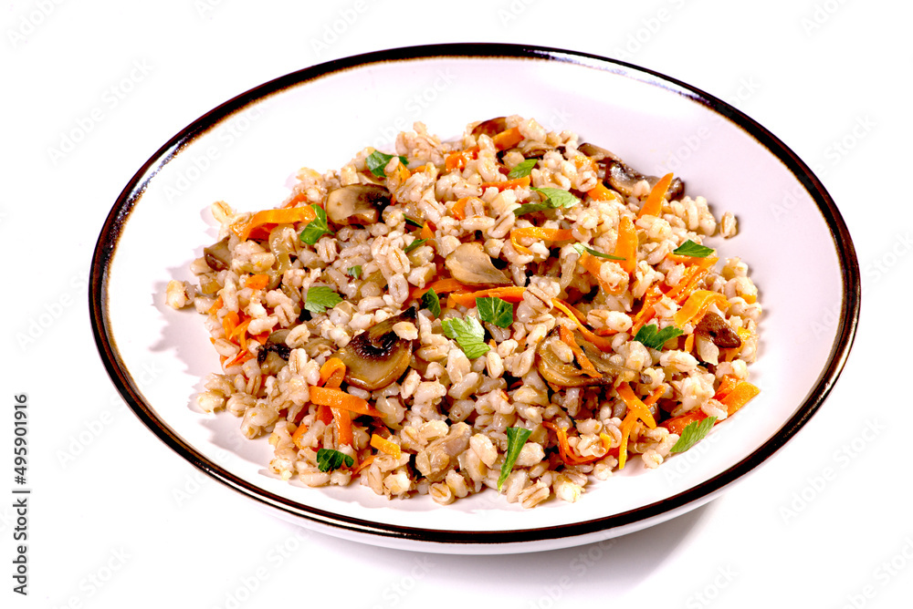 Easy bulgur pilaf (pilavi) with tomatoes in a ceramic bowl on a dark background close-up.