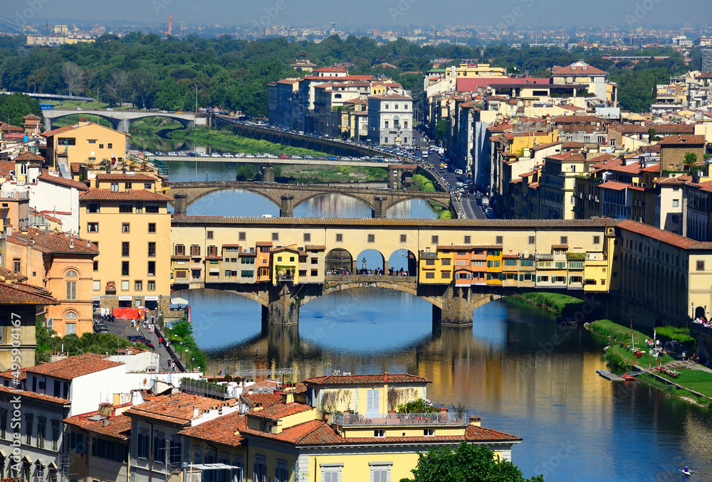 Florence, Florence Province, Tuscany, Italy. View from Piazzale Michelangelo for historic part and  bridges across Arno river, Ponte Vecchio in foreground