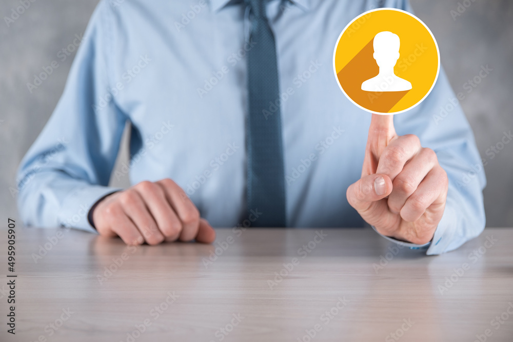 Businessman holding on hand icon of user man,woman low poly polygon style. Internet icons interface foreground. global network media concept.flat icons with long shadows Businessman holding on hand icon of user man,woman low poly polygon style. Internet icons interface foreground. global network media concept.flat icons with long shadows