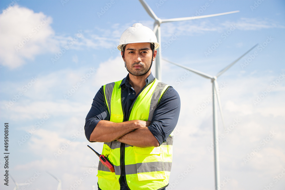 engineer team working in wind turbine farm. Renewable energy with wind generator by alternative energy concept. engineer team working in wind turbine farm. Renewable energy with wind generator by alternative energy concept.