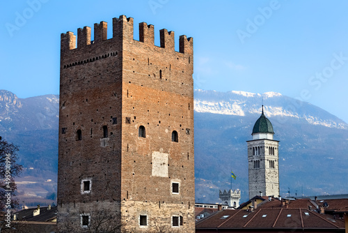 Trento: the Vanga Tower is a medieval fortification and is named after its builder, the Bishops Federico Vanga. In the background the campanile of the cathedral. Trentino Alto-Adige, Italy, Europe.