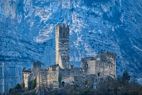 The medieval ruin of Drena castle stands out against the rocky walls of Casale Mount. Drena, Laghi Valley, Trento province, Trentino Alto-Adige, Italy, Europe. 