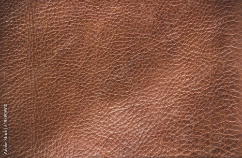 Genuine leather texture background. Dark brown texture for decoration blank.