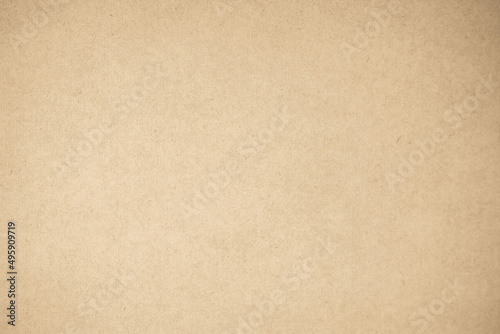 Brown recycled craft paper texture background. Cream cardboard texture, Old vintage page or grunge vignette.