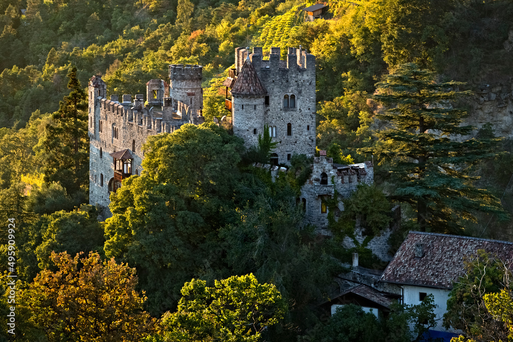 Castel Fontana/Brunnenburg has medieval origins but was rebuilt in neo-gothic style in the twentieth century. Tirol/Tirolo, Bolzano province, Trentino Alto-Adige, Italy, Europe. - obrazy, fototapety, plakaty 
