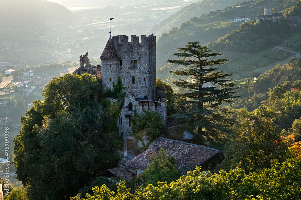 Castel Fontana/Brunnenburg has medieval origins but was rebuilt in neo-gothic style in the twentieth century. Tirol/Tirolo, Bolzano province, Trentino Alto-Adige, Italy, Europe.