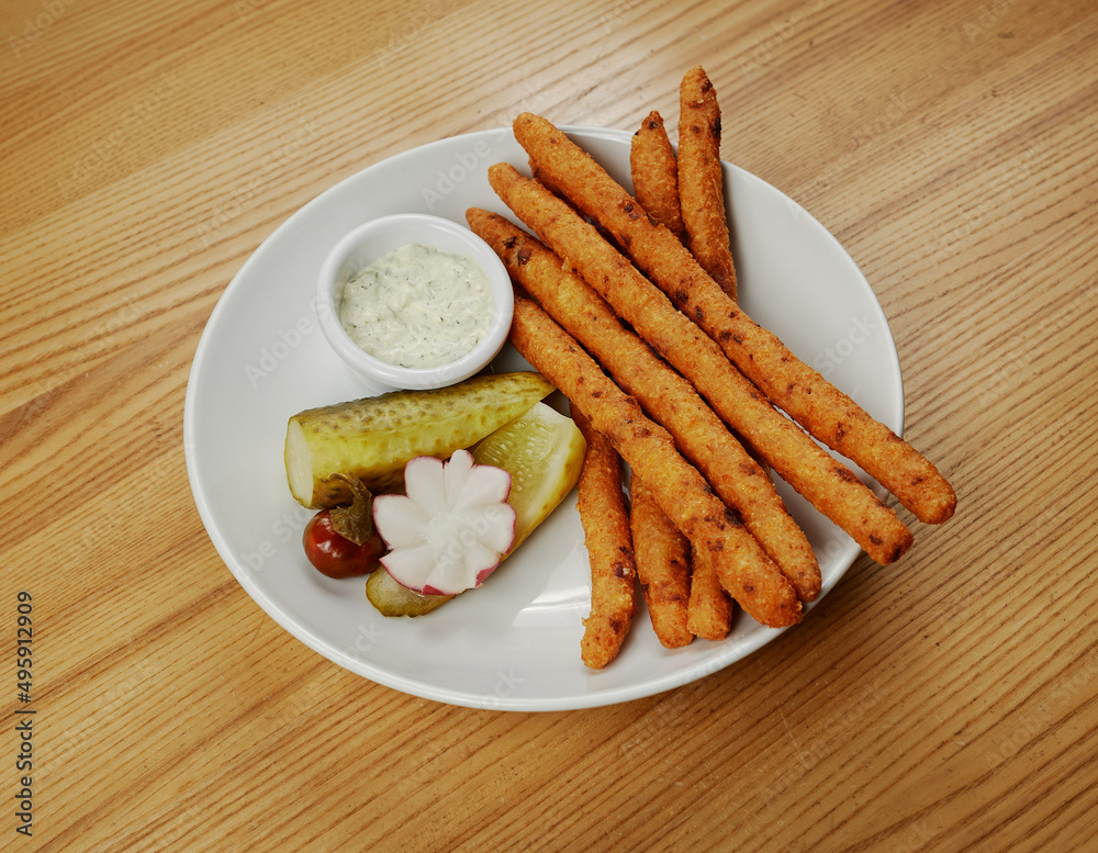 fried cheese sticks with sauce and cucumber fried cheese sticks with sauce and cucumber