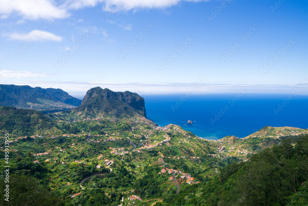 Miradouro da Portela, view of Penha de agua mountain and eagle rock and Porto Da Cruz, Madeira island