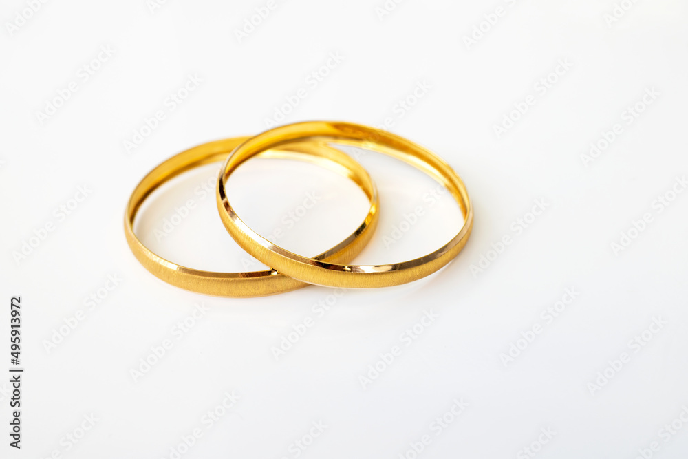 Golden bracelets , isolated on white background Golden bracelets , isolated on white background