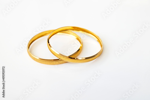 Golden bracelets , isolated on white background