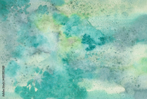 Banner for design painted with watercolor emerald shades. Paper texture. Abstract watercolor background of sea wave color.
