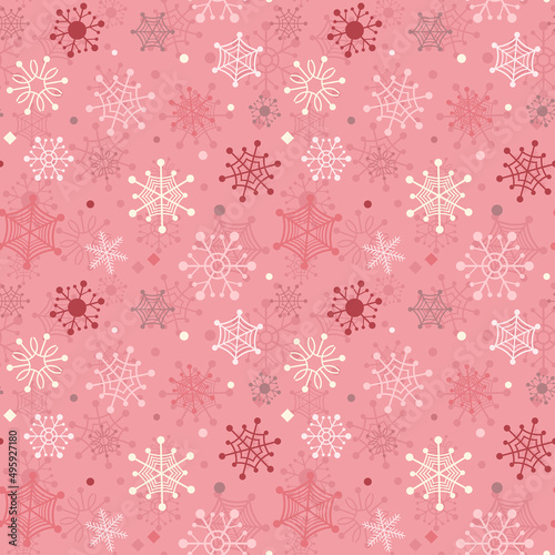 Red winter seamless background with color snowflakes