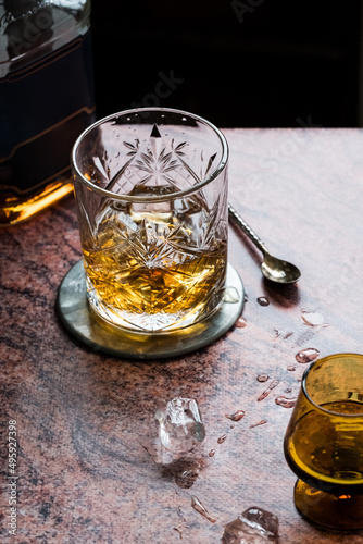 Glass of whiskey on restaurant table