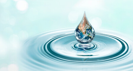 World water day. A globe in the shape of a drop of water falling on blue sea background. Elements of this image furnished by NASA