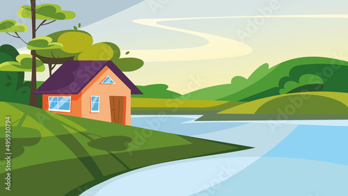 House on the lake in summer season. Beautiful nature landscape.