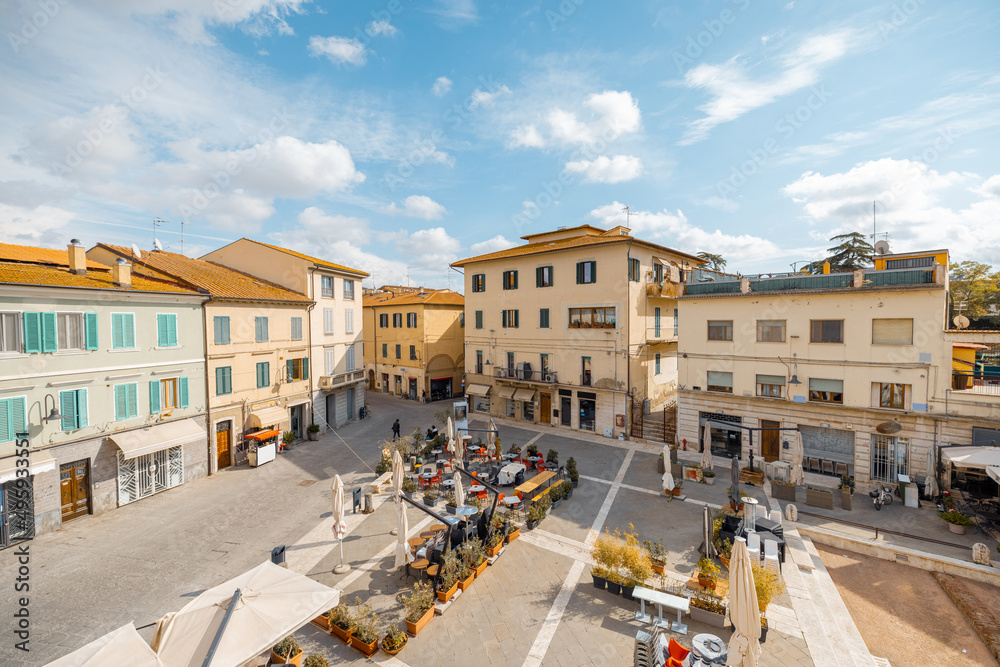 Market square in Grosseto town on sunny autumn day. Main city of Maremma region in Italy