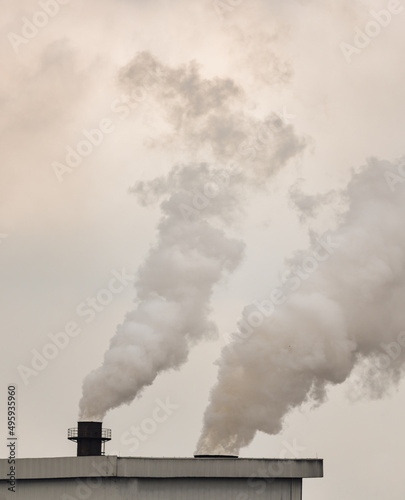 Emission smoke pollution to the air from industrial plant chimney