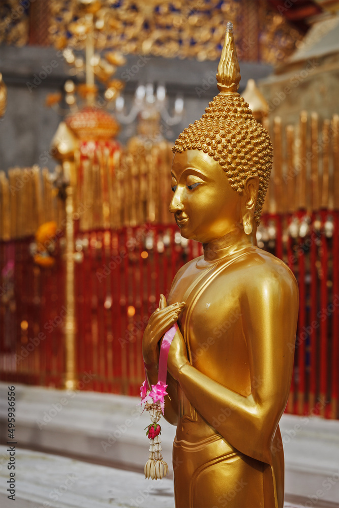 Standing Buddha statue in Wat Phra That Doi Suthep, Chiang Mai, Thailand Standing Buddha statue in Wat Phra That Doi Suthep, Chiang Mai, Thailand