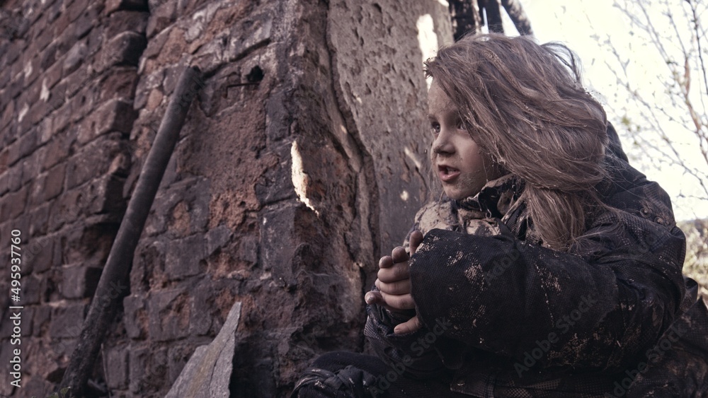 girl praying. Children without a home, apocalypse, war girl praying. Children without a home, apocalypse, war