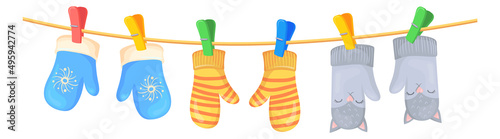 Wool mittens hanging on string. Cartoon winter frost hand gloves