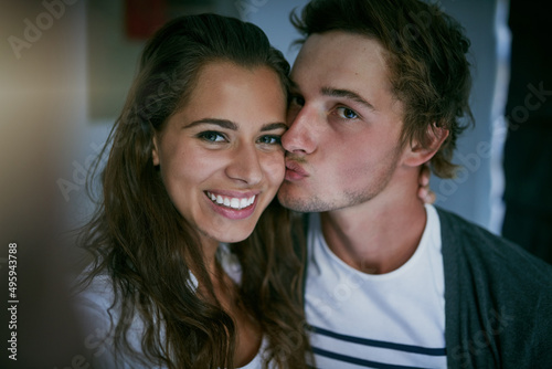 We complete each other. Cropped shot of an affectionate young couple at home.