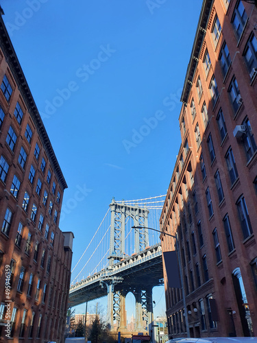 The Manhattan Bridge is a suspension bridge across the East River in New York City. The bridge was designed by Leon Moyzff. It is now a major tourist destination in New York, USA.