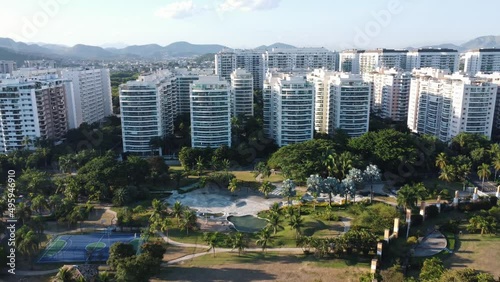 Aerial view of a park in Rio de Janeiro, Brazil. Residential buildings and mountains around. Sunny day. Drone take. photo