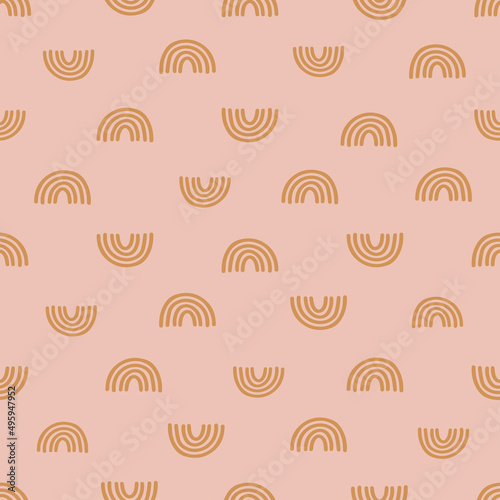 Brown hand drawn rainbow seamless pattern with pink background.