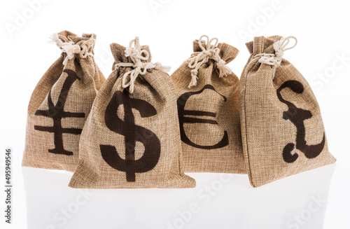 Money bags with international currency signs