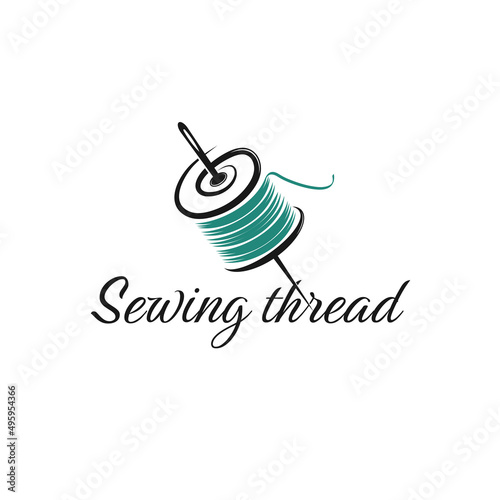 Vector illustration of a vintage logo for a tailor's workshop and a handmade clothing store. design schedule for logo abstract spool with thread and needle photo