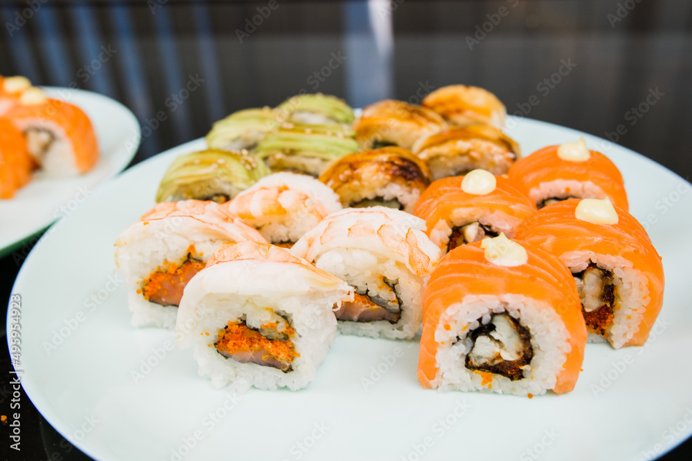 set of rolls set sushi with avocado shrimp salmon and eel set of rolls set sushi with avocado shrimp salmon and eel