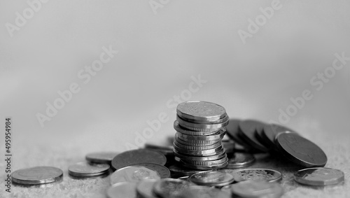 money coins piled up on a surface no people stock photo