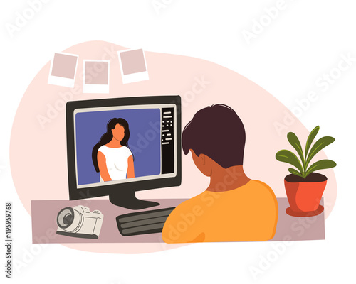 A professional photographer works in a photo editing application or software on their personal computer. Photo editor Retouch photos of a beautiful girl. Courses, master class or online training.