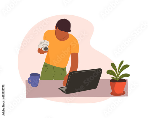 A professional photographer stands at his desk and looks into a laptop. A man in a photo studio. Online courses, master class, training. Vector illustration