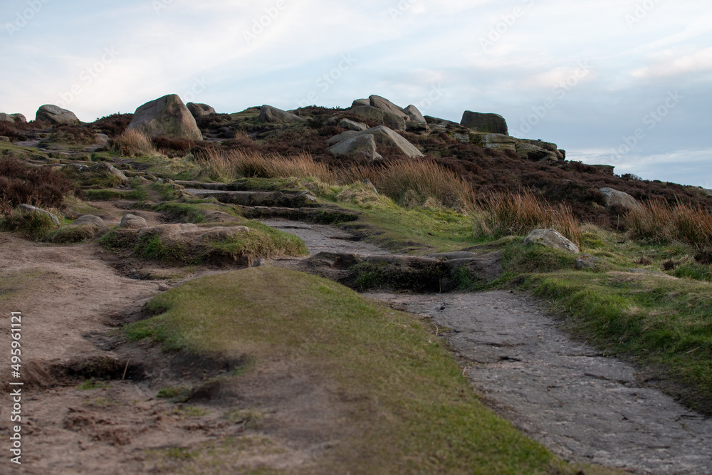 Rocks and hilly scenery of Higger Tor. Natural rock formation in the Peak District, close to Sheffield, UK