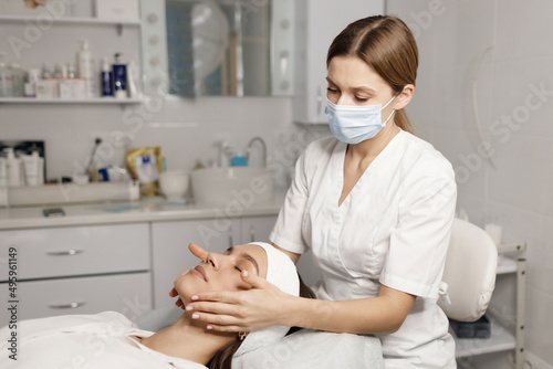 cosmetological procedure for pretty female mask and massage