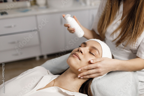 cosmetological procedure for pretty female mask and massage