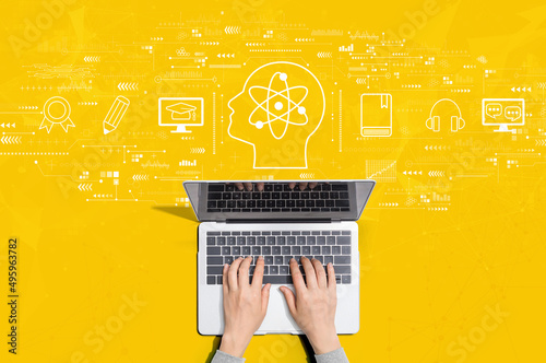 Online education concept with person using a laptop computer