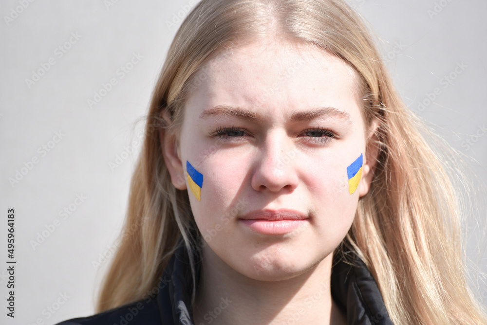 Portrait of Ukrainian blond hair girl with flag of Ukraine Portrait of Ukrainian blond hair girl with flag of Ukraine