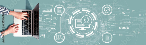 Document management system concept with person using a laptop computer