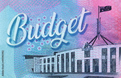 Fotografie Close up of an Australia five dollar note showing a line drawing of parliament house Canberra, and text reading Budget