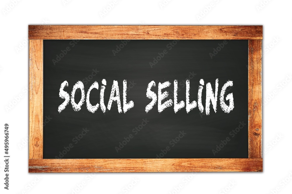 SOCIAL SELLING text written on wooden frame school blackboard. SOCIAL SELLING text written on wooden frame school blackboard.