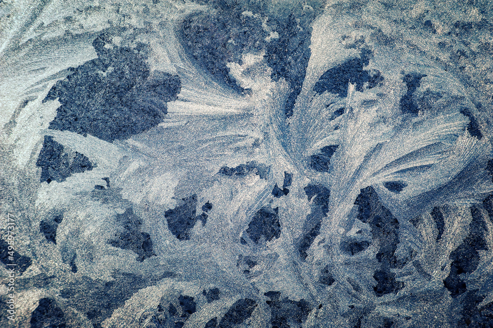 Naklejka premium Ice frost patterns on winter glass