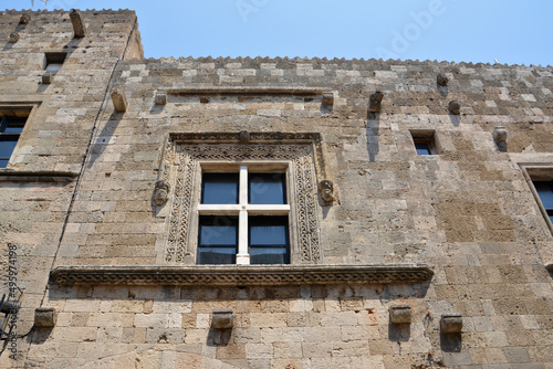 window on medieval brick wall, close-up